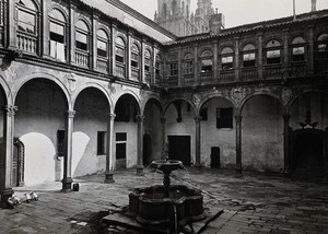 view Hospital Real, Santiago de Compostela: view of the courtyard showing the fountain. Photograph, ca.1900.