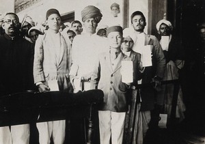 view The Pasteur Institute Hospital, Kasauli, India: Indian patients holding treatment cards awaiting inoculation against rabies. Photograph, ca. 1910.