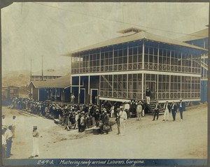 view Panama Canal construction workers on arrival at the train station, Gorgona. Photograph, ca. 1910.