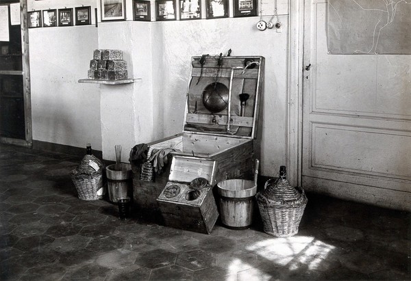 The anti-malaria school, Nettuno, Italy: a wooden trunk and its contents: fumigation equipment. Photograph, 1918/1937 (?).