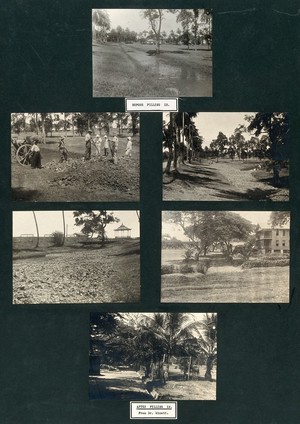 view African (?) workers filling in a narrow ditch running through a field with palm trees and a colonial-style wooden house in the background, Africa (?). Photograph by (Edward Pigott ?) Minett, 1910/1920 (?).