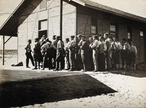 view Soldiers queueing for their demobilization medical inspection. Photograph, ca. 1945 (?).