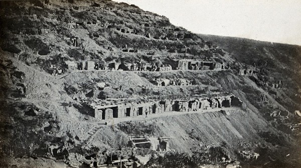 Gallipoli, Turkey: Australian and New Zealand Army Corps (ANZAC) dug-outs on a hillside. Photograph, 1915.