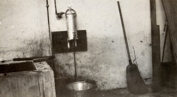 Barranquilla, Colombia: a water filter attached to a tap at the Yellow Fever Campaign office. Photograph, 1900/1930.