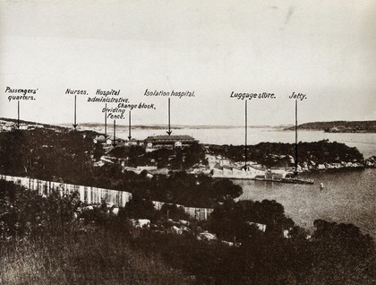 Sydney, New South Wales: the quarantine station: view from the mainland showing the isolation hospital and the jetty. Reproduction of a photograph, 1880/1910 (?).