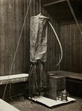 view Typhus prevention equipment: the Lelean sack disinfestor, used to disinfest clothing and kill lice carrying typhus. Photograph, 1900/1920 (?).