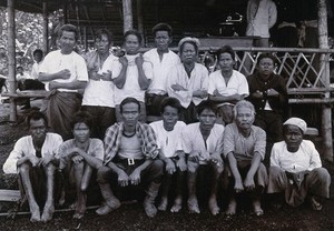 view Chiengmai Leper Asylum, Thailand: a group of male patients. Photograph, 1921.