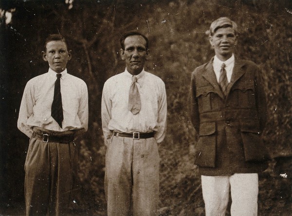 Leprosy sufferers, India: three Anglo-Indian men. Photograph, 1900/1920.