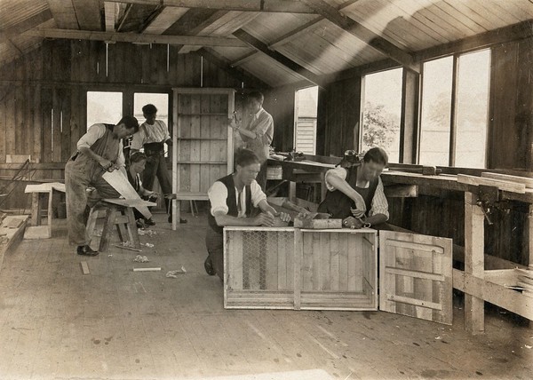 Elswick Sanitorium, Lancashire: patients doing carpentry work. Photograph, 1900/1920.