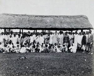 view Charingia, Assam, India: kala-azar patients; a group of men, women and children. Photograph, 1900/1920 (?).