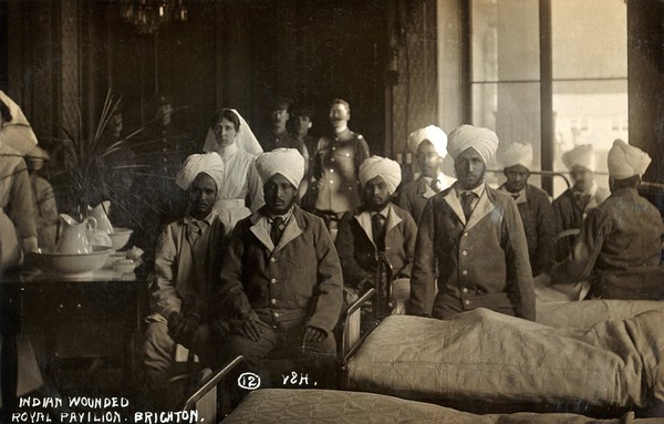World War One: convalescent Indian soldiers in a ward in the Royal Pavilion, Brighton. Photograph, 1914/1918.