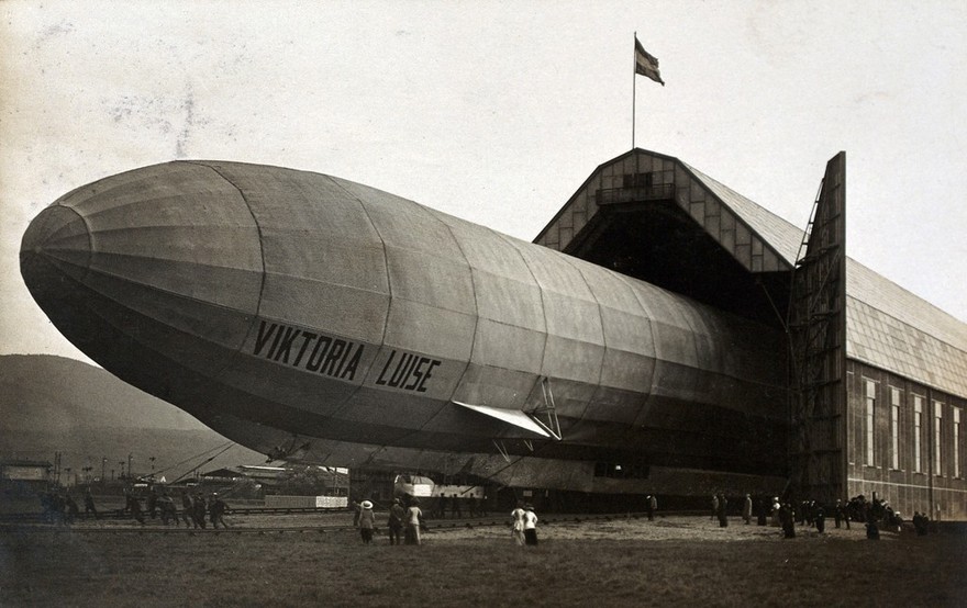 World War One: the zeppelin Viktoria Luise emerging from its hangar. Photograph, 1912/1915.
