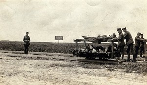 view World War One: (Lille?), France: West Riding Casualty Clearing Station: soldiers with a trolley of the wounded. Photograph, 1916.