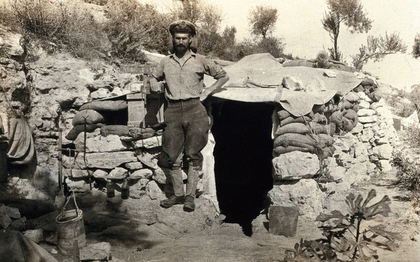 World War One: Colonel Taylor outside his dug-out. Photograph, 1914/1918.