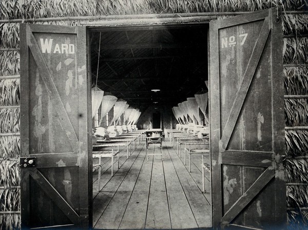 World War One: a Royal Naval hospital, Hong Kong: a ward interior with empty beds. Photograph, 1914/1918.