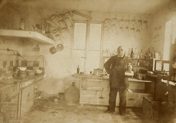 A French chemist in his laboratory. Photograph, 1880/1890.