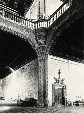 Hospital de Santa Cruz, Toledo, Spain: detail of the ornate 16th century gallery and an inner doorway. Photograph, ca. 1935.