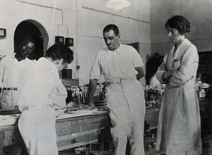 view Medical Research Institute, Accra: medical researchers working on yellow fever. Photograph, 1928.