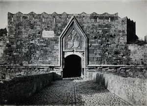 view Rhodes: a gateway in the old walls of the city. Photograph, 1931.