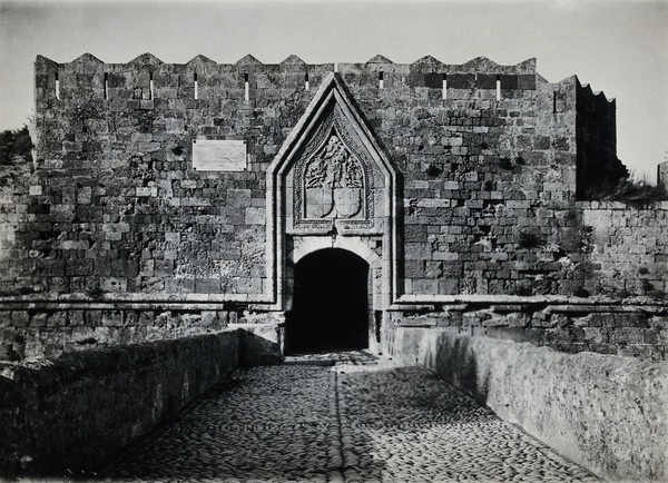 Rhodes: a gateway in the old walls of the city. Photograph, 1931.