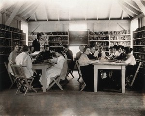 view Mont Alto Sanatorium for tuberculosis, Pennsylvania: an 'Americanization' class for adult patients of non-American origin. Photograph, 1925.