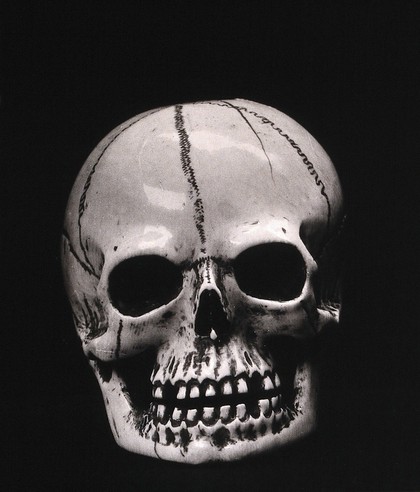 A model of a skull, carved in ivory: front view. Photograph, 1936.