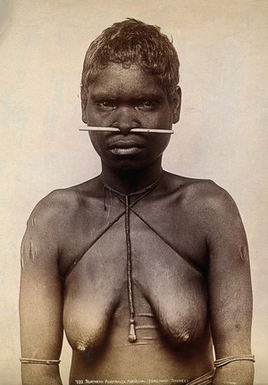 view Australia: an aboriginal woman with a bone through her nose. Photograph by Henry King, ca. 1890.