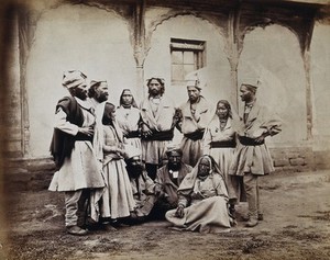 view Sikkim and Tibet: eleven people of the Chumba (Chumbi) Valley; two of the women wear large nose rings. Photograph, 18--.