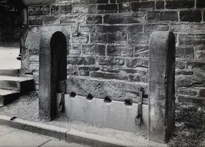 view Almondbury, near Huddersfield, Yorkshire: the stocks. Photograph by Fred H. Crossley, ca. 19--.