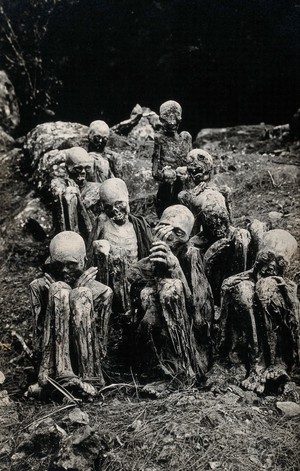 view Mummified remains of eight Igorot people, Philippines.