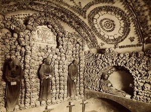 view Santa Maria della Concezione, Rome: skulls and skeletons of the friars arranged in arches and columns around the walls of the Convento dei Cappuccini. Photograph.