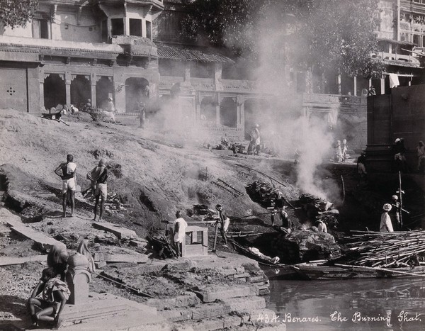 Benares (Varanasi), Uttar Pradesh: corpses being burned and consigned to the river Ganges. Photograph.