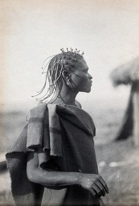 South Africa: a Pondo man with an elaborate hairstyle. Photograph, ca. 1900.