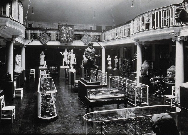 Wellcome Historical Medical Museum, Wigmore Street, London: the galleried Hall of Statuary. Photograph.