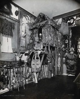 Wellcome Historical Medical Museum, Wigmore Street, London: a head-hunter's hut, south east New Guinea, in the Hall of Primitive Medicine. Photograph.