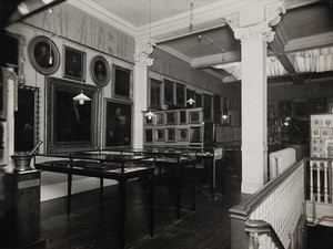 view Wellcome Historical Medical Museum, Wigmore Street, London: west wall of the Gallery of Pictures. Photograph.