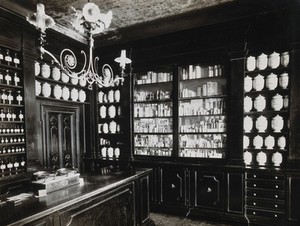 view Wellcome Historical Medical Museum, Wigmore Street, London: a display of pharmacy jars. Photograph.
