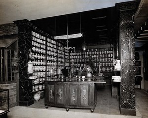 view Wellcome Historical Medical Museum, Wigmore Street, London: reconstruction of a seventeenth-century Italian pharmacy. Photograph.