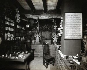 view Wellcome Historical Medical Museum, Wigmore Street, London: interior of a reconstruction of a seventeenth-century English apothecary's shop. Photograph.