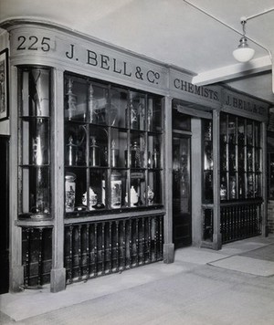 view Wellcome Historical Medical Museum, Wigmore Street, London: exterior of a reconstruction of J. Bell's pharmacy in the ground floor galleries. Photograph, c. 1928.