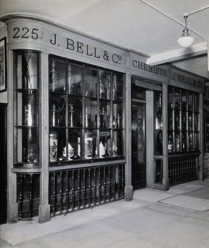 Wellcome Historical Medical Museum, Wigmore Street, London: exterior of a reconstruction of J. Bell's pharmacy in the ground floor galleries. Photograph, c. 1928.