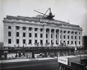 view The Wellcome Research Institution building, Euston Road, London: frontage during final stages of construction by Trollope & Colls, 1931. Photograph.