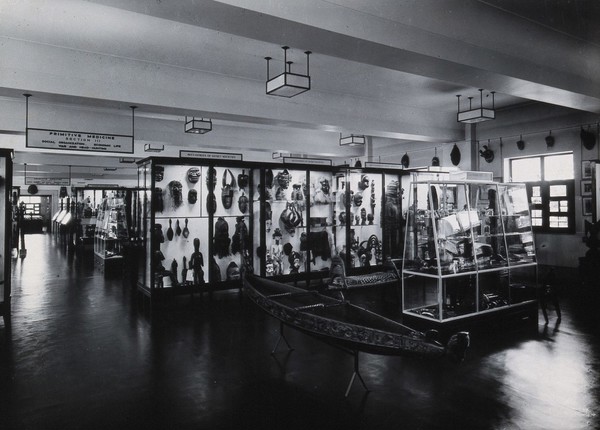The Wellcome Research Institution building, Euston Road, London: looking through the Primitive Medicine Gallery of the Wellcome Historical Medical Museum. Photograph, n.d. [c. 1939].