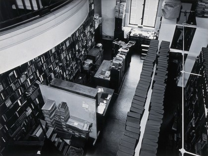 The Wellcome Building, Euston Road, London: part of the Hall of Statuary as adapted for the Library, c. 1960. Photograph.