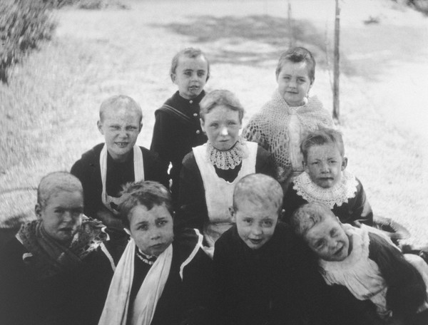 Gloucester smallpox epidemic, 1896: nine convalescent children. Photograph by H.C.F., 1896.
