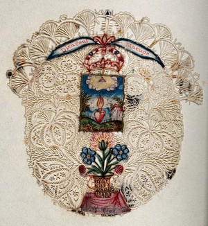 view A landscape with the Sacred Heart and an appearance of the Eye of God; below a pot of flowers on a table, with filigree border. Coloured cut paper work.