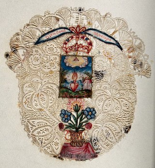 A landscape with the Sacred Heart and an appearance of the Eye of God; below a pot of flowers on a table, with filigree border. Coloured cut paper work.