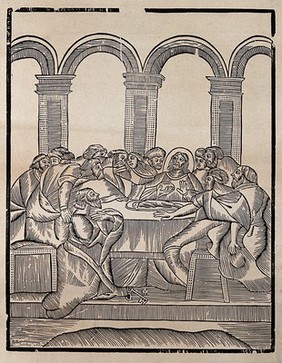 The Last Supper: Saint Peter kneeling in front of the table, Judas sits at the extreme right. Woodcut.