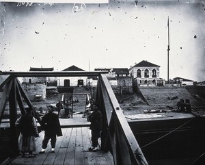 view Kiukiang, Kiangsi province, China. Photograph, 1981, from a negative by John Thomson, ca. 1870.