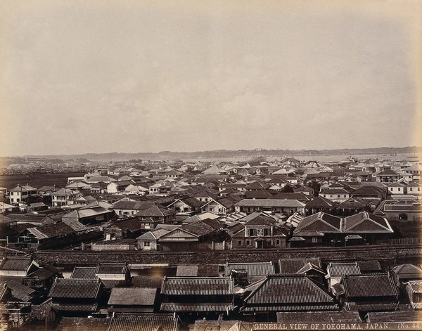 Yokohama, Japan: panoramic view of Yokohama town, looking towards the harbour. Photograph by W.P. Floyd, ca. 1873.
